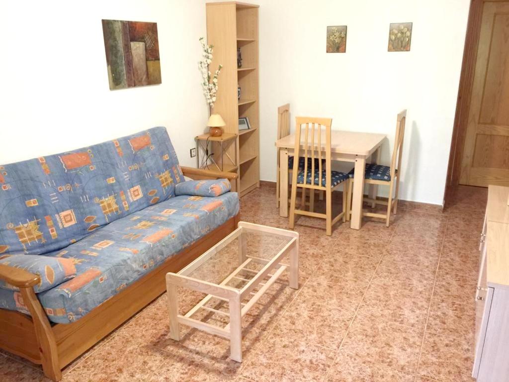 Zona de estar de 2 bedrooms appartement with shared pool and wifi at Monte Faro