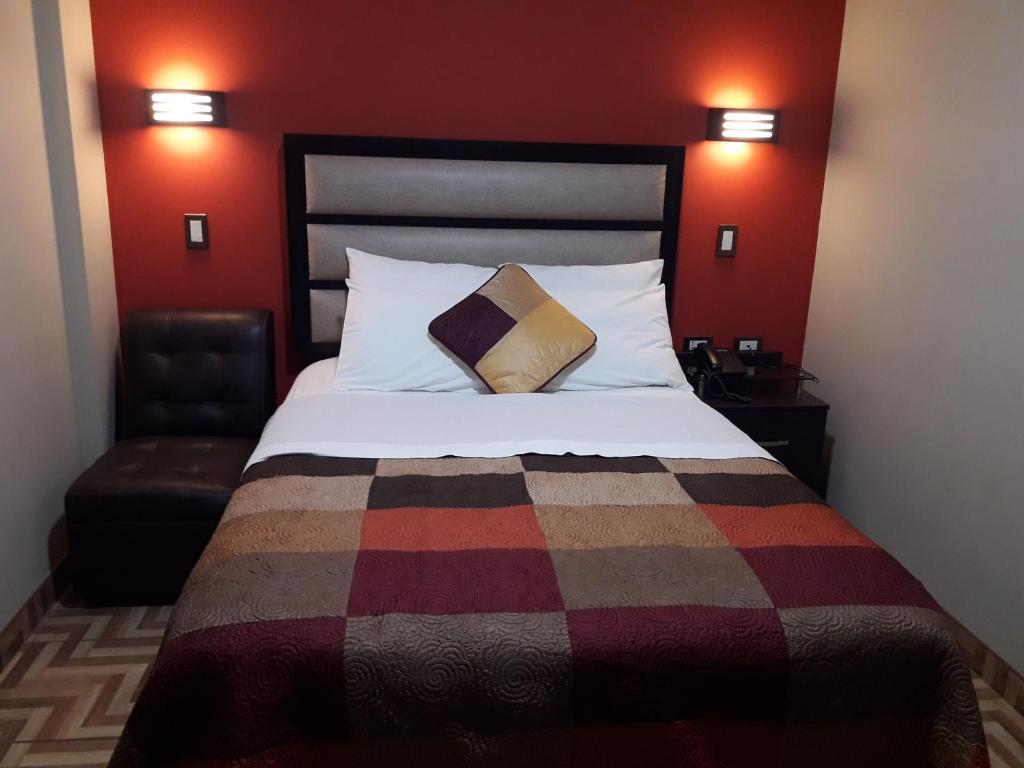 Postel nebo postele na pokoji v ubytování Gavina Inn Hotel