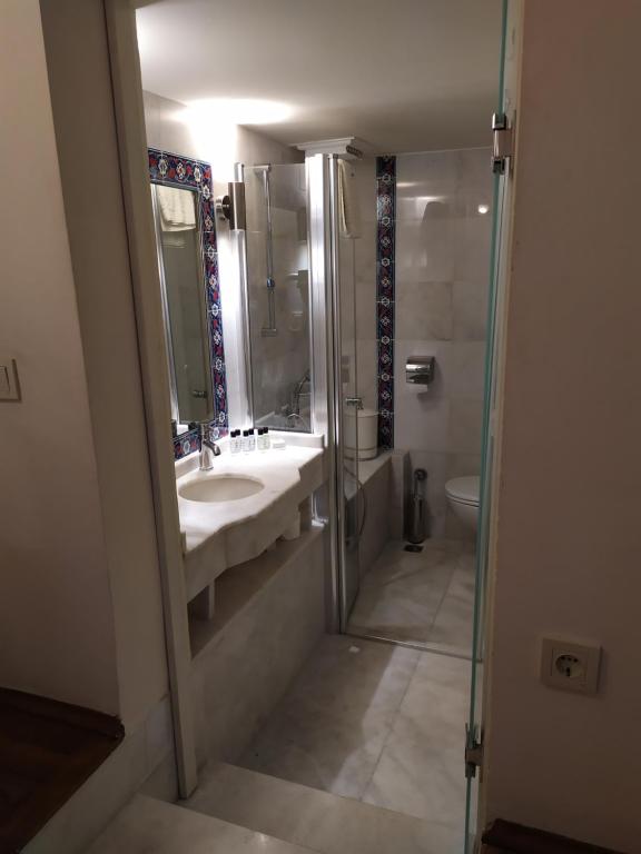 Koupelna v ubytování Minyon Hotel
