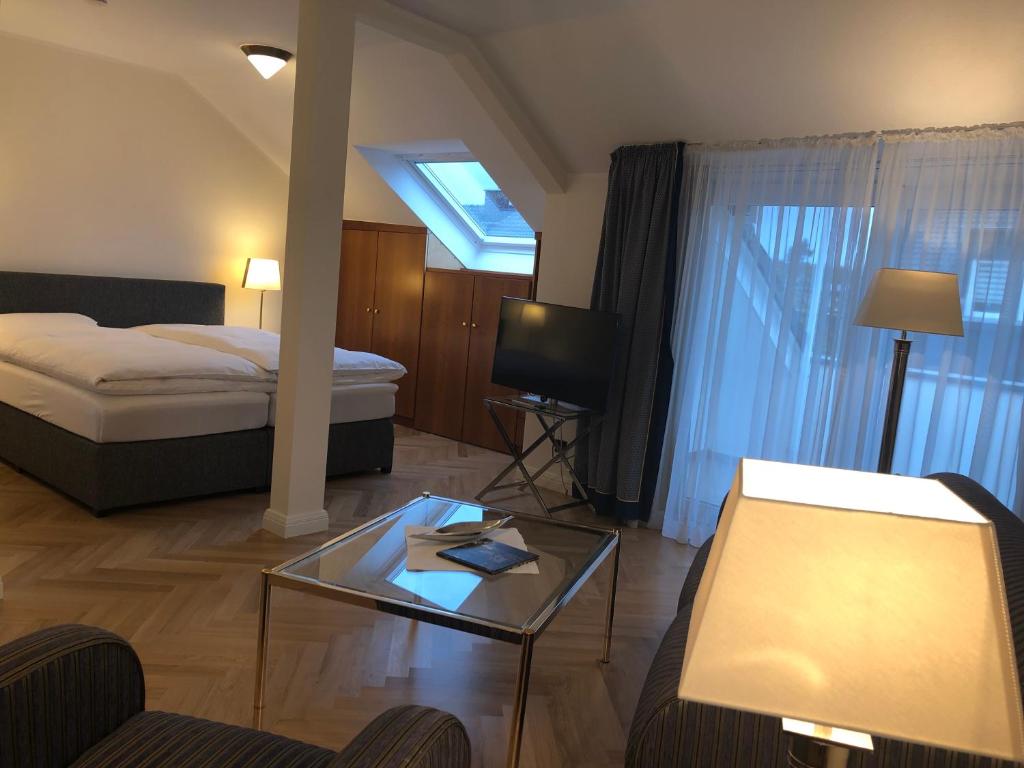 Postel nebo postele na pokoji v ubytování Hotel Scherf