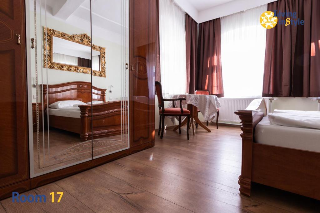 Postel nebo postele na pokoji v ubytování Living inStyle
