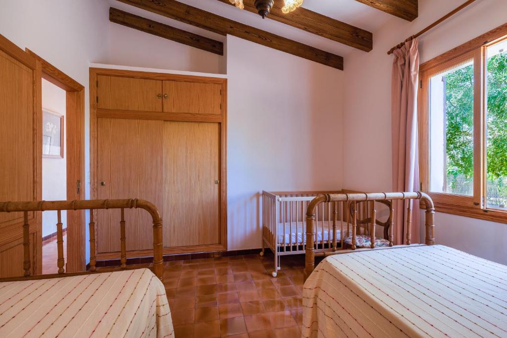 Postel nebo postele na pokoji v ubytování Finca Fontanet Binifarda