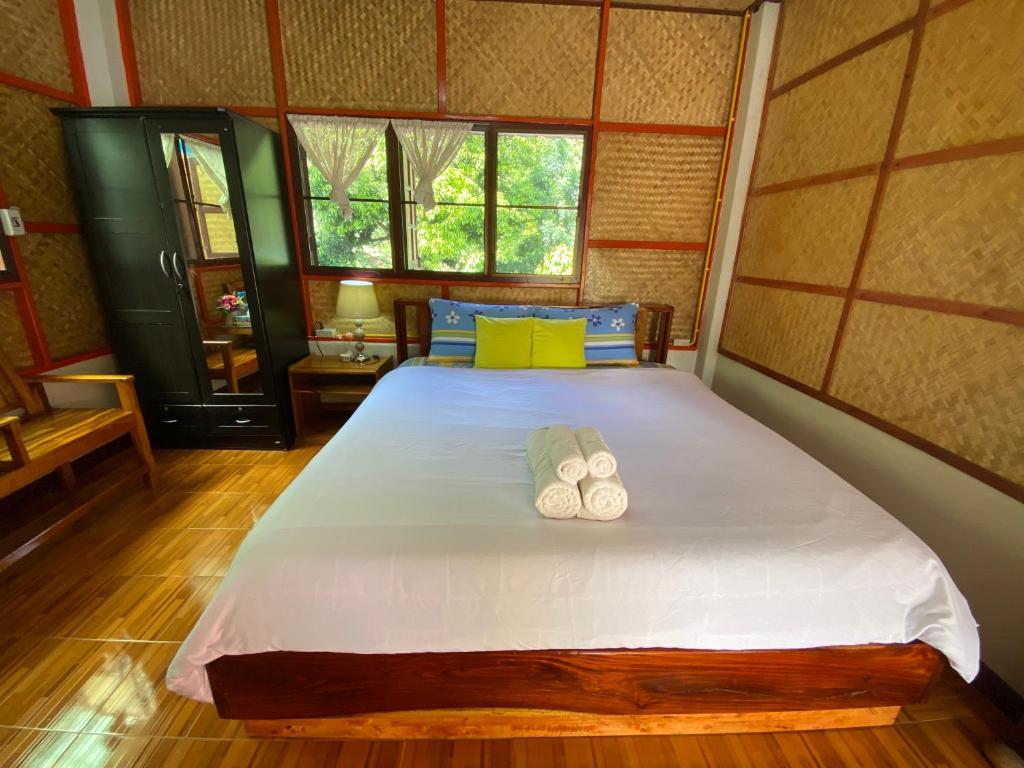 Postel nebo postele na pokoji v ubytování Yayee Homestay