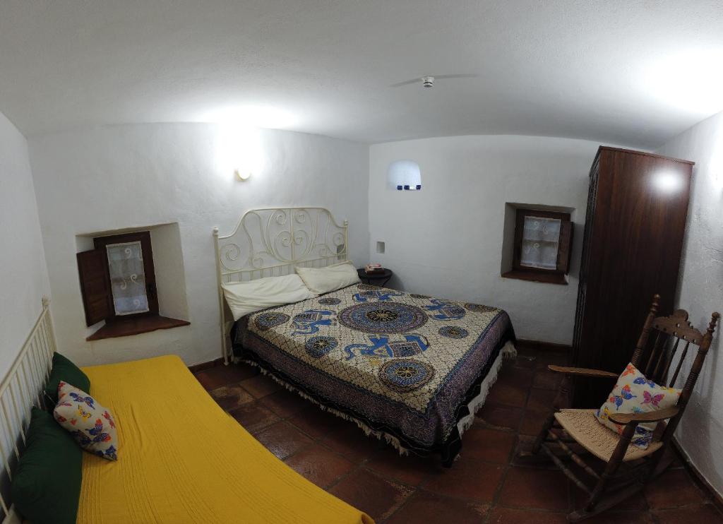 Postel nebo postele na pokoji v ubytování Molino de Simón