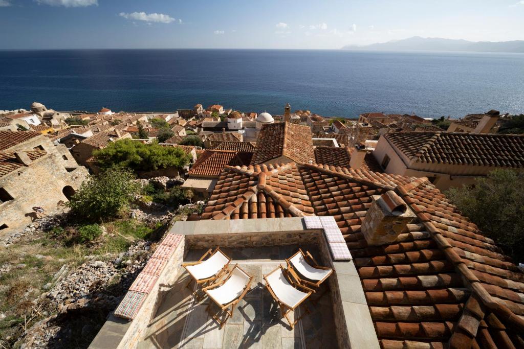 an aerial view of a town with the ocean at Victoria's House in Monemvasia Castle in Monemvasia