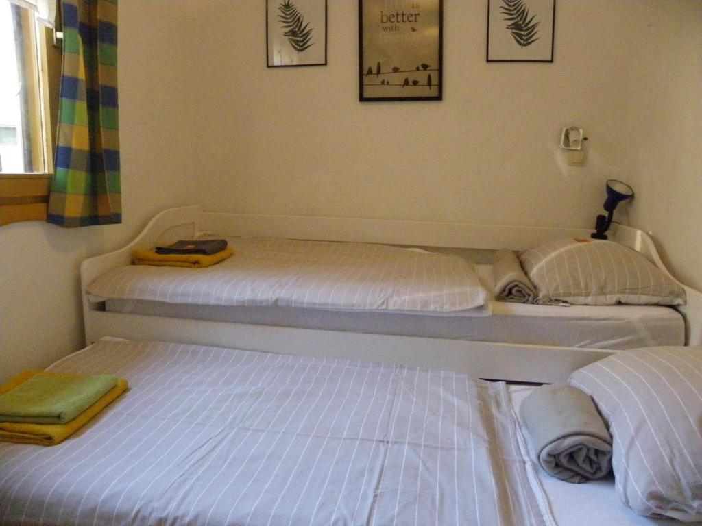 Postel nebo postele na pokoji v ubytování InGreen house