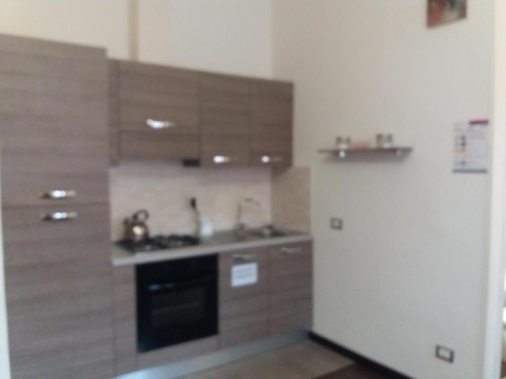 Kuchyňa alebo kuchynka v ubytovaní Casa Vacanze Lory