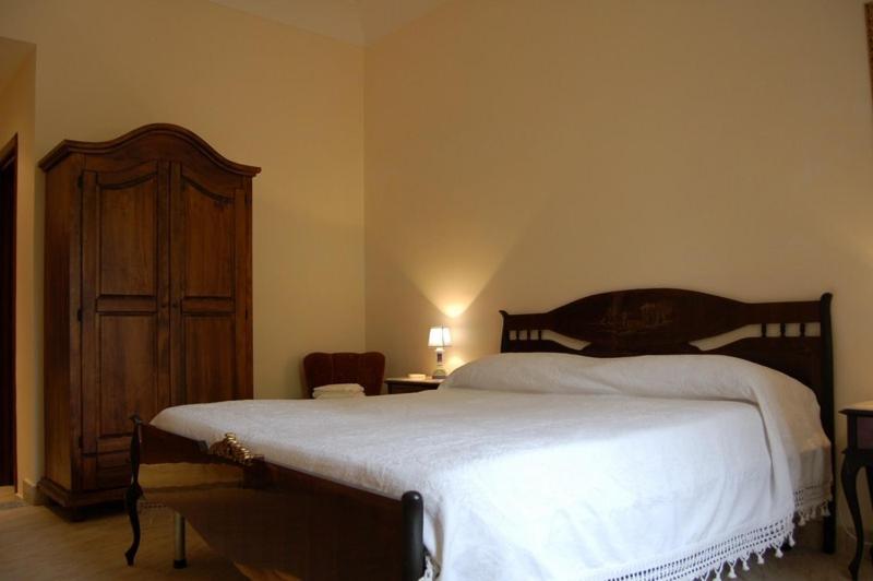 Łóżko lub łóżka w pokoju w obiekcie La Durlindana B&B