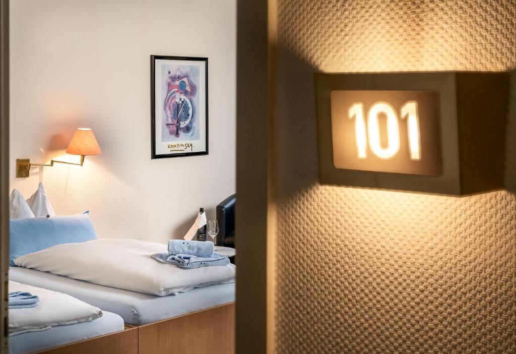 Postel nebo postele na pokoji v ubytování Sunibel Inn