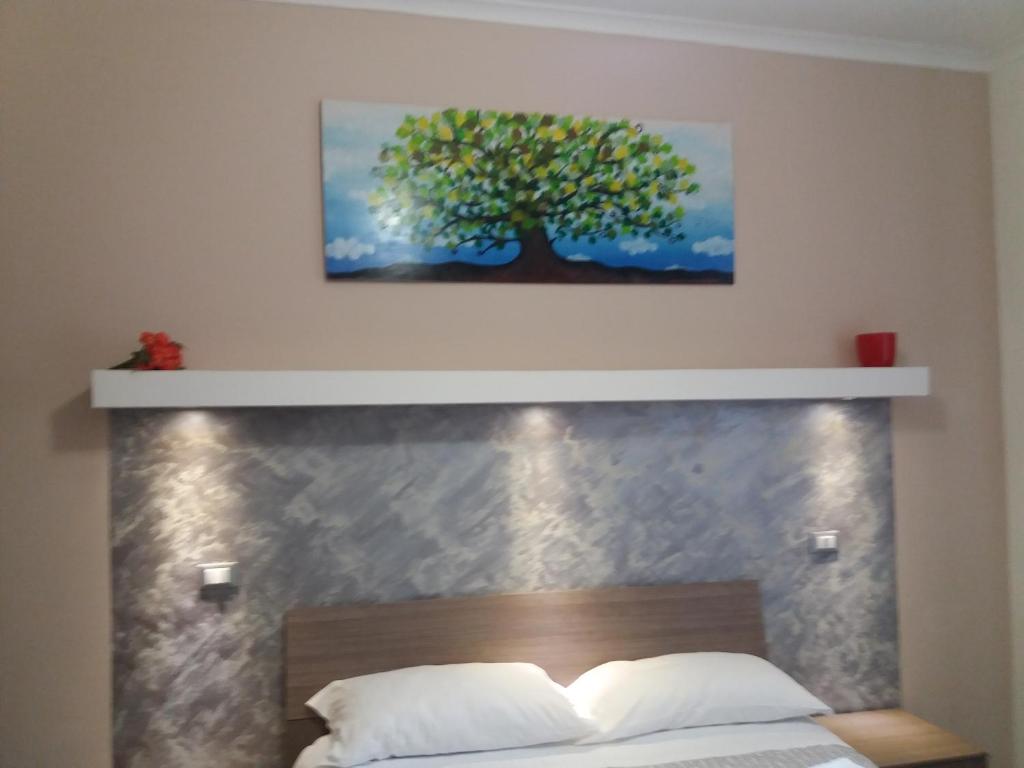 Posteľ alebo postele v izbe v ubytovaní Casa Vacanze Lory