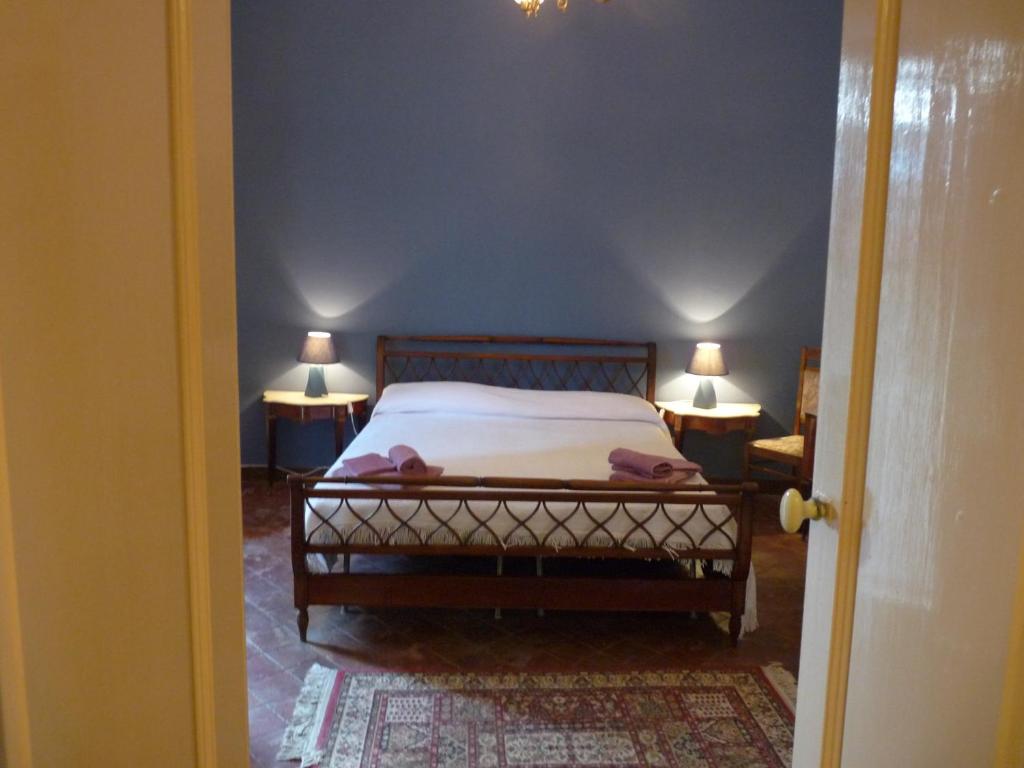 Łóżko lub łóżka w pokoju w obiekcie La Durlindana B&B