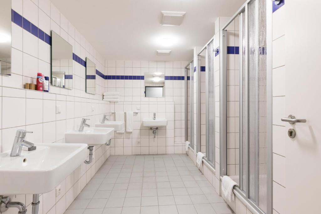 Koupelna v ubytování mk monteurzimmer eschborn