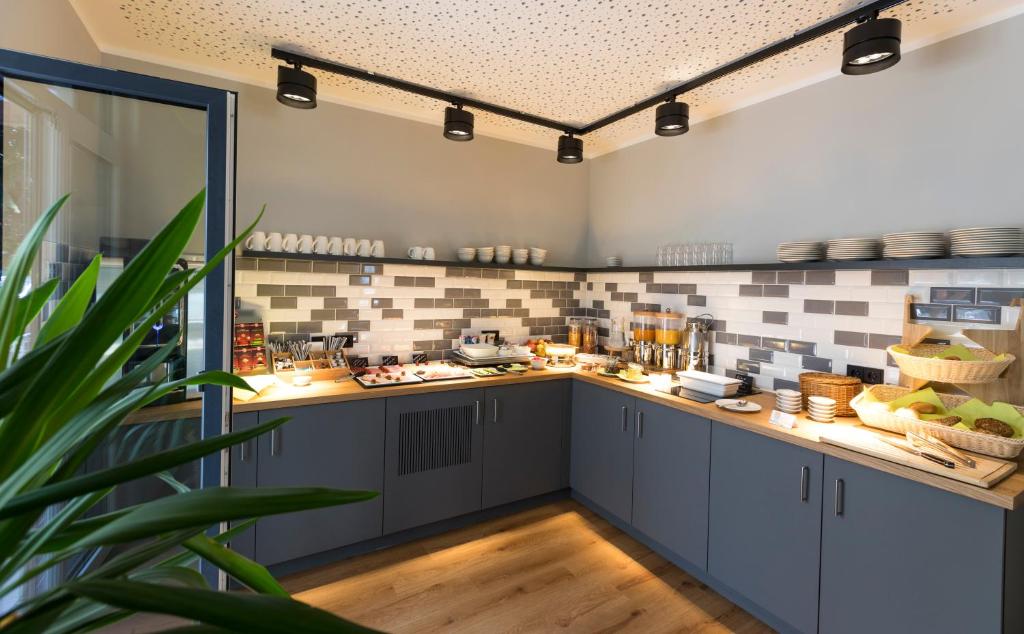 Kuchyň nebo kuchyňský kout v ubytování mk monteurzimmer eschborn