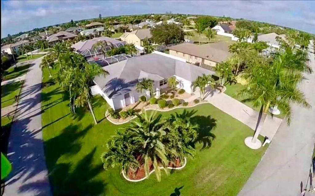 an aerial view of a mansion with palm trees at VILLA PALM ISLAND in Cape Coral