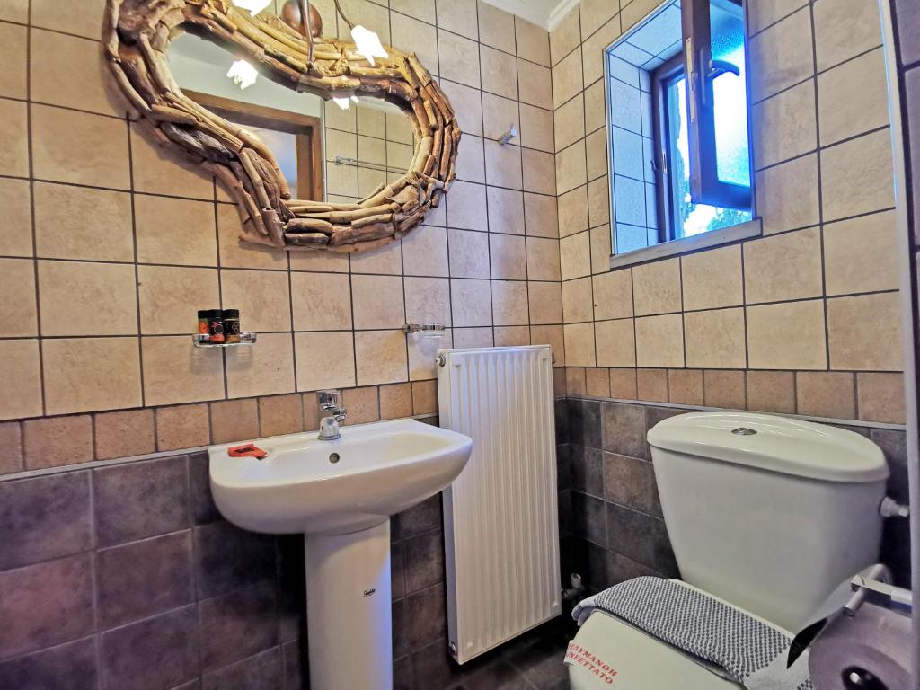 Kúpeľňa v ubytovaní Guesthouse Toxotis