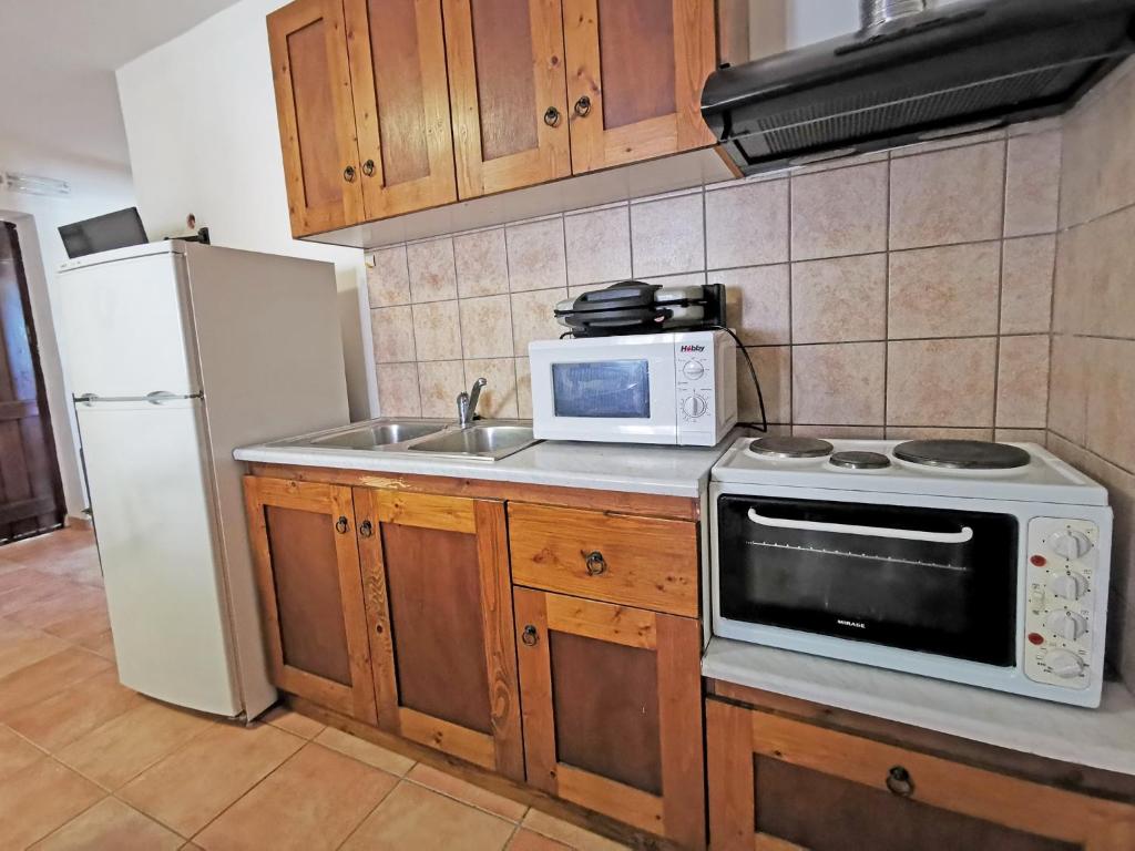 Kuchyňa alebo kuchynka v ubytovaní Guesthouse Toxotis