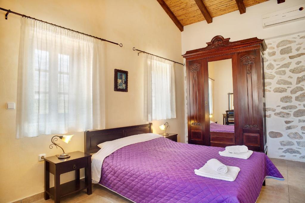 Posteľ alebo postele v izbe v ubytovaní Guesthouse Toxotis