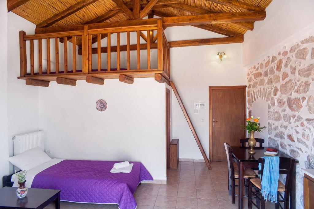 Posteľ alebo postele v izbe v ubytovaní Guesthouse Toxotis