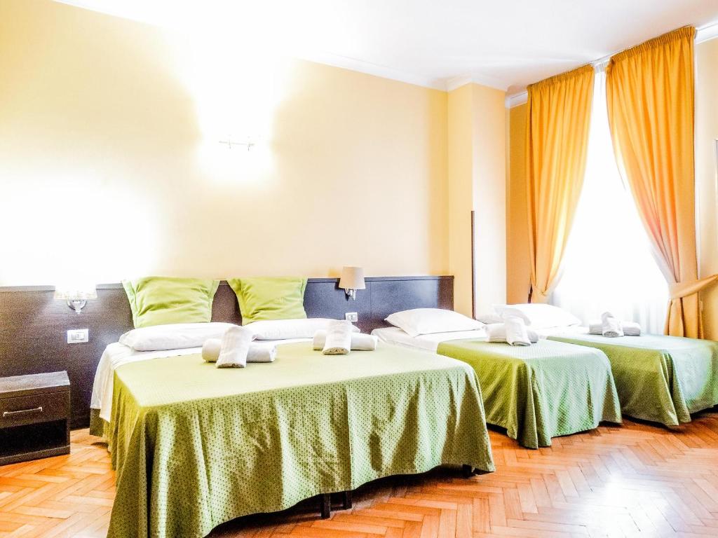 Posteľ alebo postele v izbe v ubytovaní B&B Morelli 1