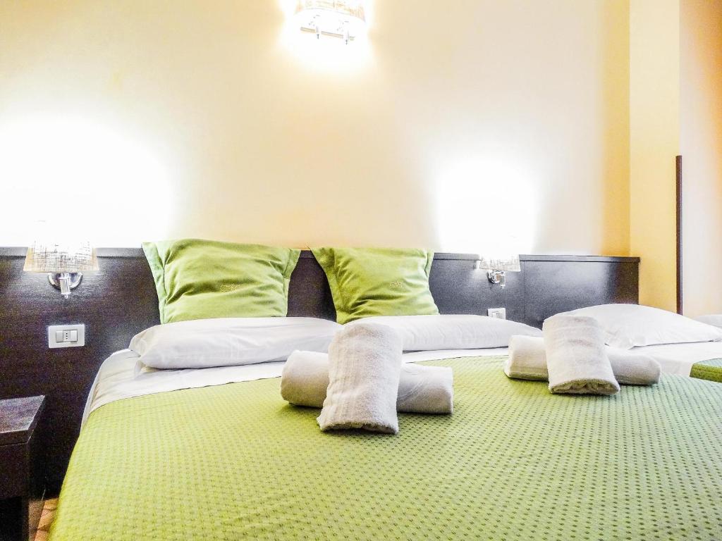 Posteľ alebo postele v izbe v ubytovaní B&B Morelli 1