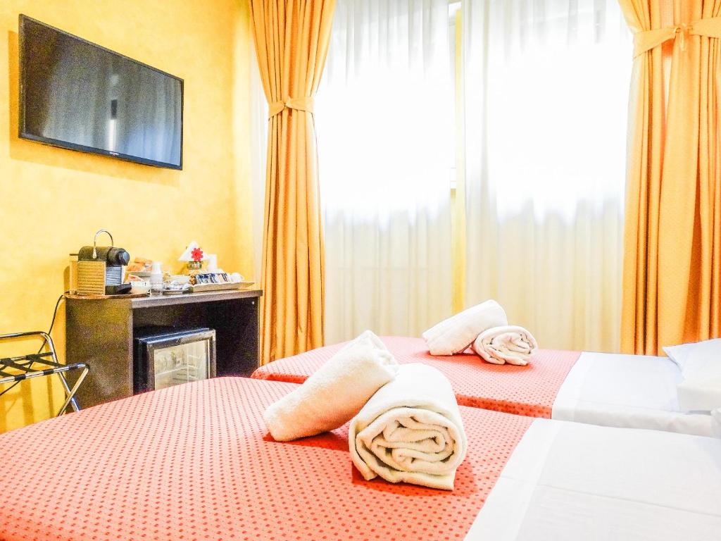 Posteľ alebo postele v izbe v ubytovaní B&B Morelli 1