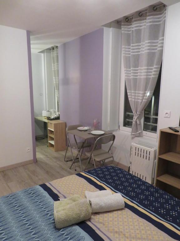 Posezení v ubytování Les Chambres Studios de Pleslin-Foucher