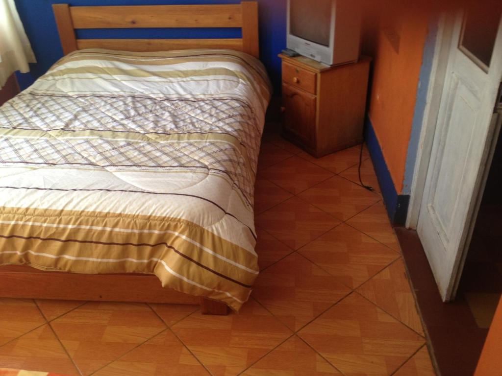 Postel nebo postele na pokoji v ubytování Hospedaje Rocha