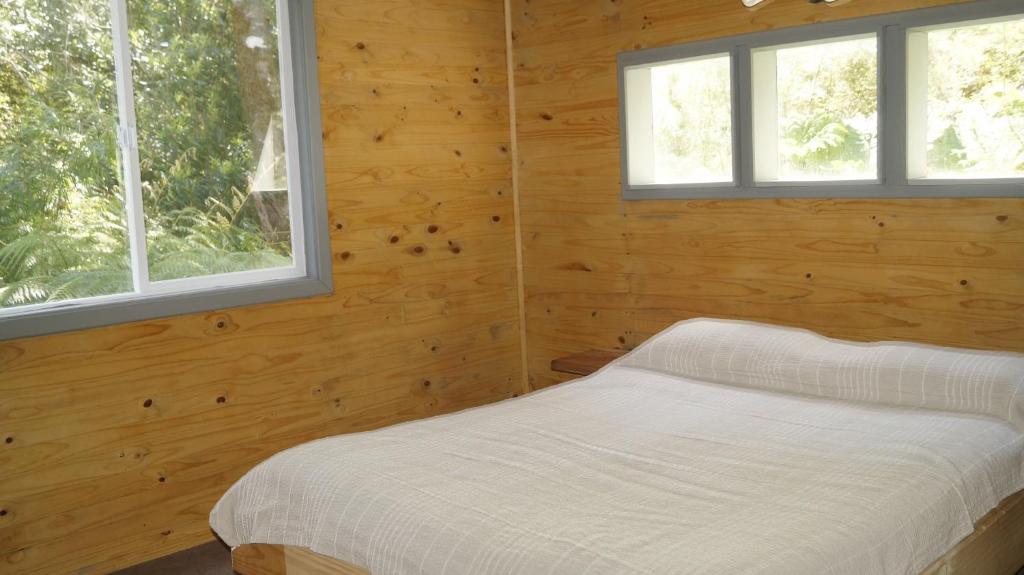 Postel nebo postele na pokoji v ubytování Posada de Expediciones Kahuel
