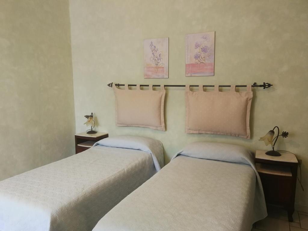 Postel nebo postele na pokoji v ubytování B&B Del Viale