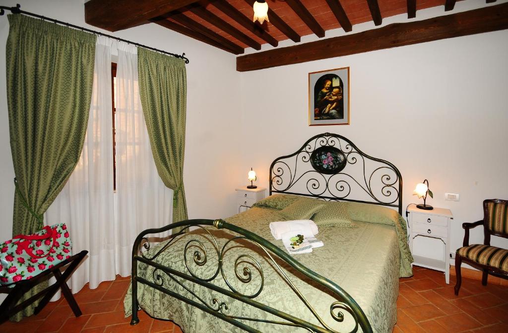 Postel nebo postele na pokoji v ubytování B&B Camere La Vite