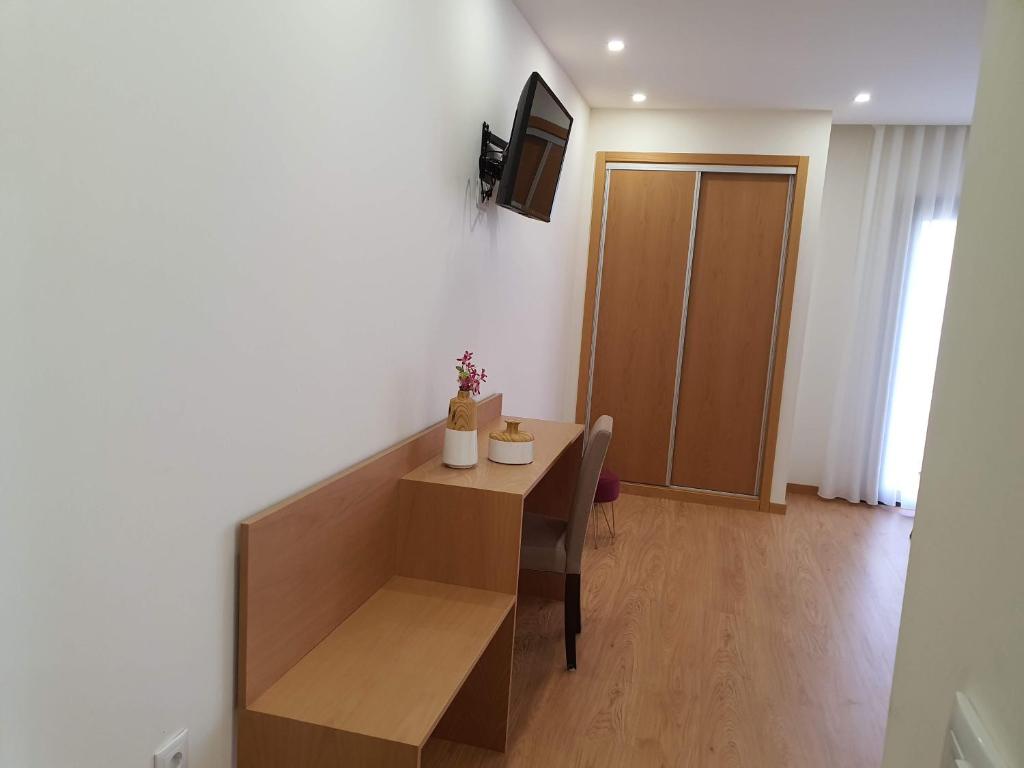 TV a/nebo společenská místnost v ubytování Residencial Dom Manuel
