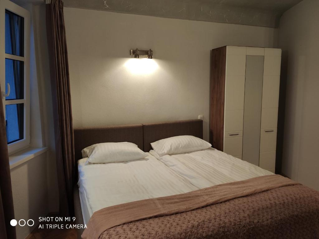 Postel nebo postele na pokoji v ubytování Aparthotel Cross Street 4