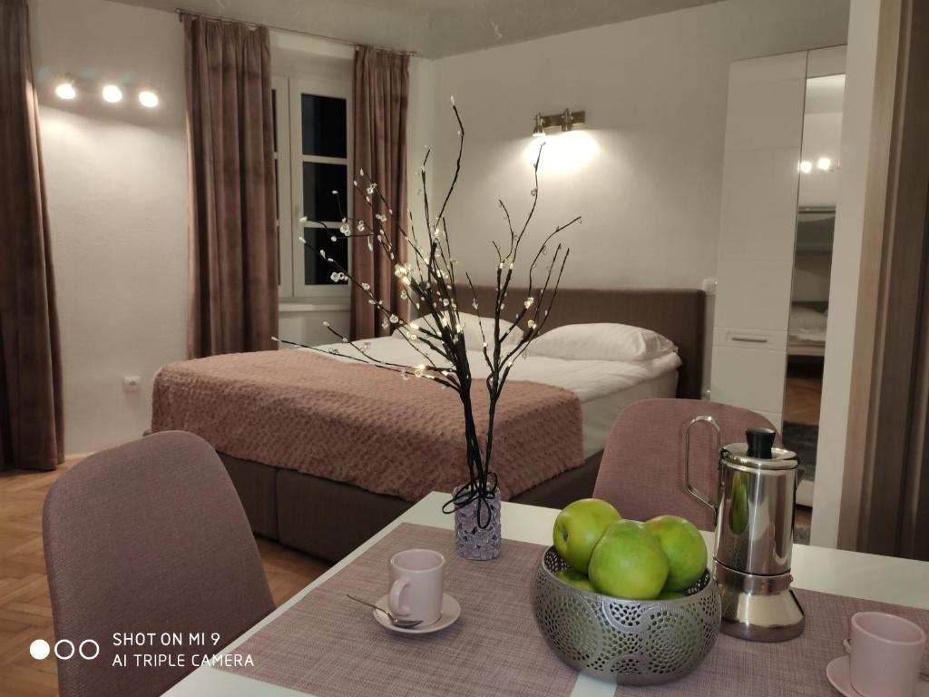 Postel nebo postele na pokoji v ubytování Aparthotel Cross Street 4