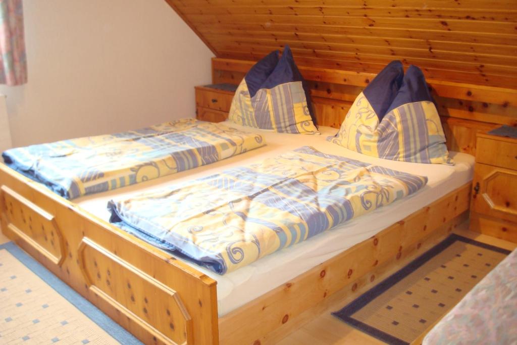 Postel nebo postele na pokoji v ubytování Gästehaus Moser