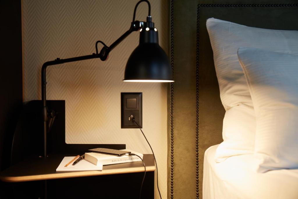 Postel nebo postele na pokoji v ubytování Boutique Hotel Josef