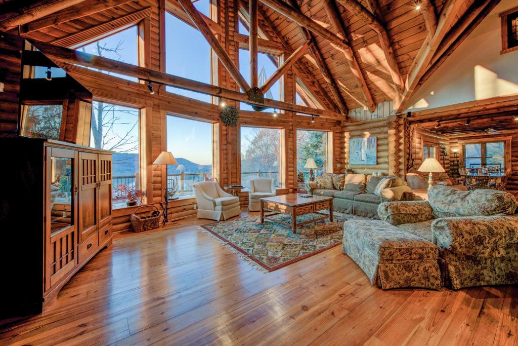 a living room with a couch and a tv at Cooper's Run in McHenry