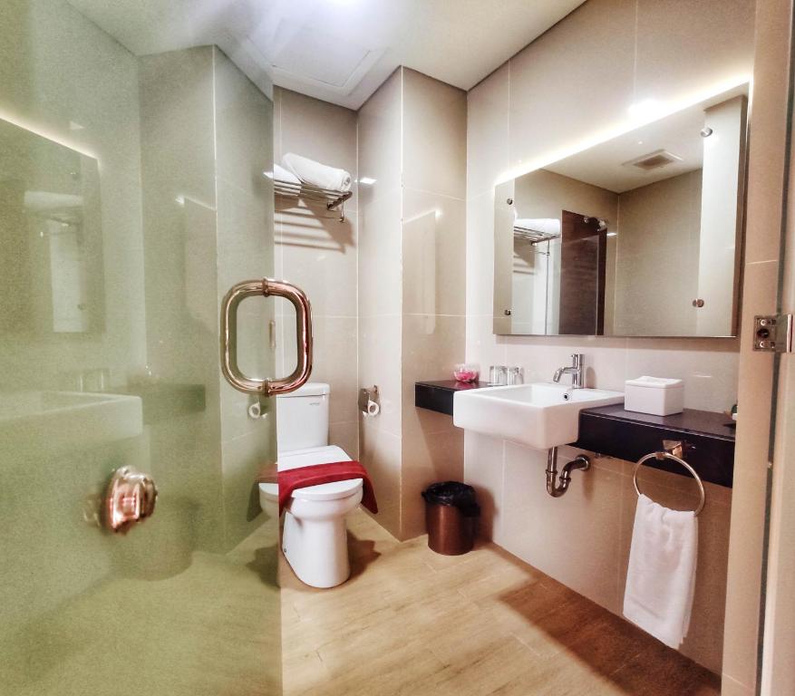 Koupelna v ubytování Grand Parama Hotel