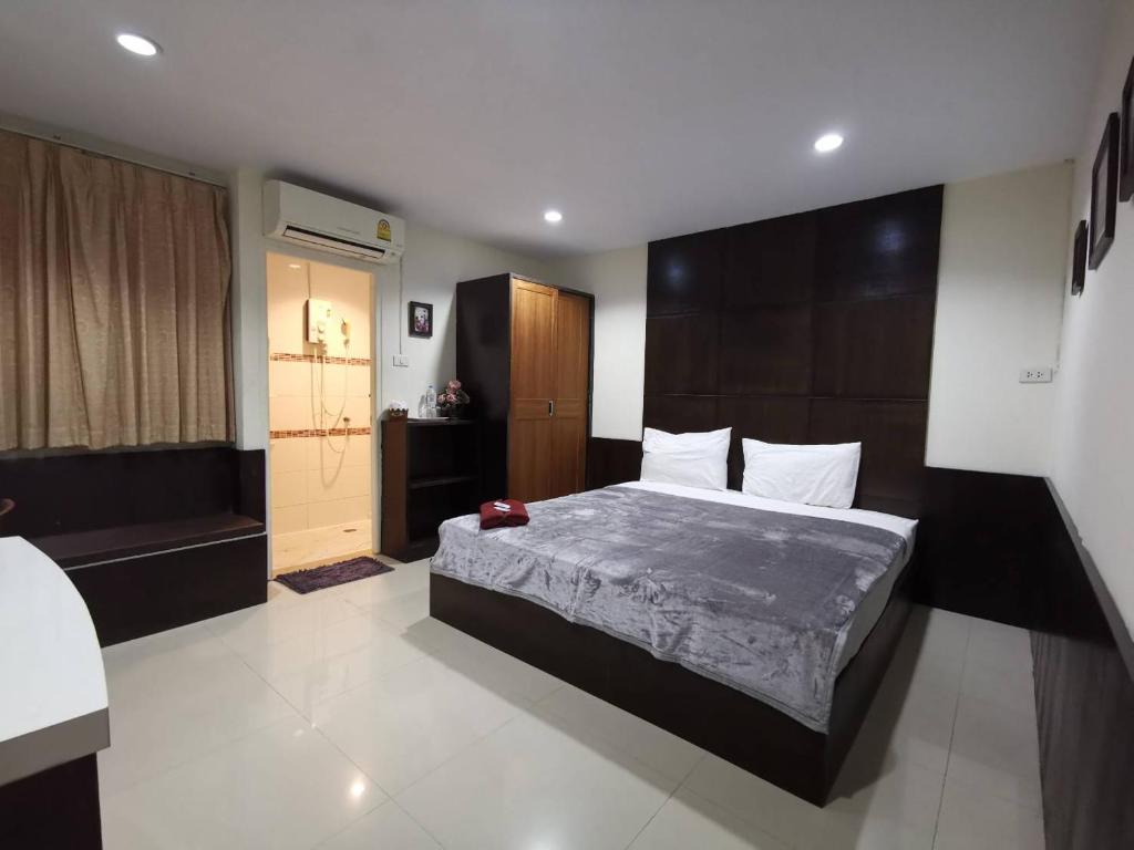 Postel nebo postele na pokoji v ubytování Ban Kaew Guesthouse Songkhla