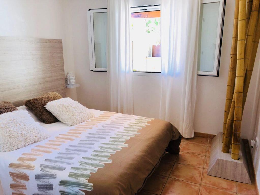 Postel nebo postele na pokoji v ubytování Villas2meet Mallorca