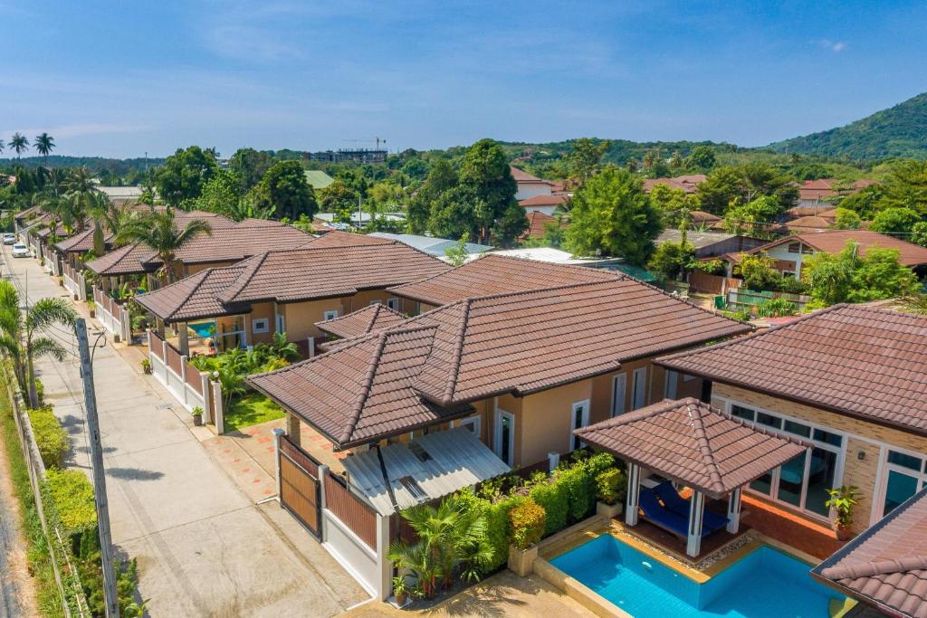 an overhead view of a row of houses with roofs at Rawai Private Villas - Pools and Garden in Rawai Beach