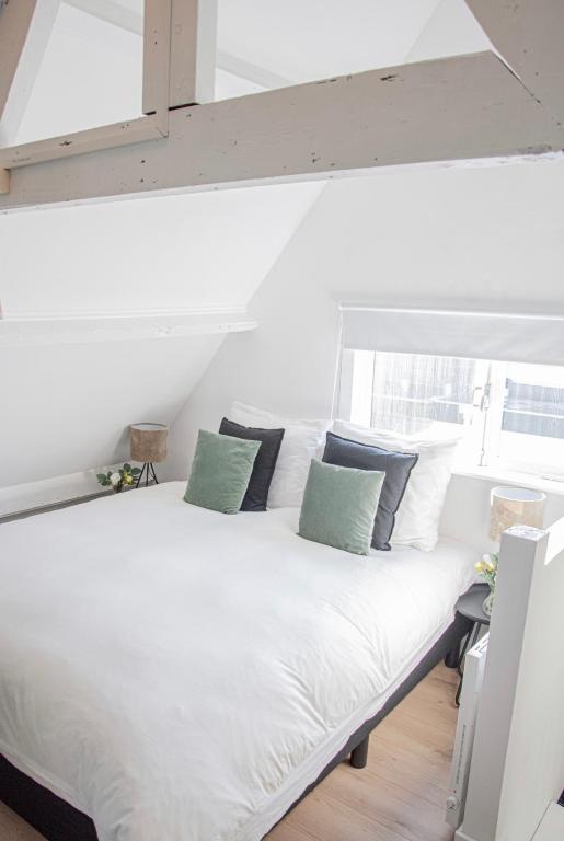Postel nebo postele na pokoji v ubytování Tiny House Lindenhouse