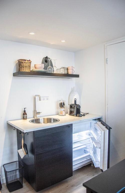 Kuchyň nebo kuchyňský kout v ubytování Tiny House Lindenhouse