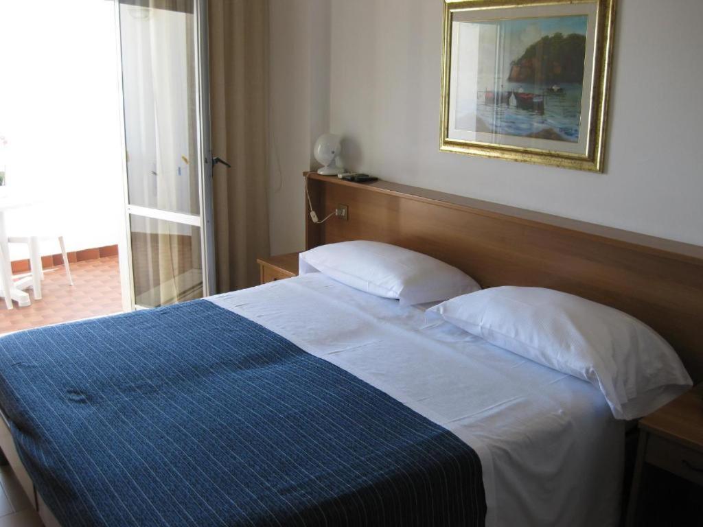Letto o letti in una camera di San Domenico Hotel