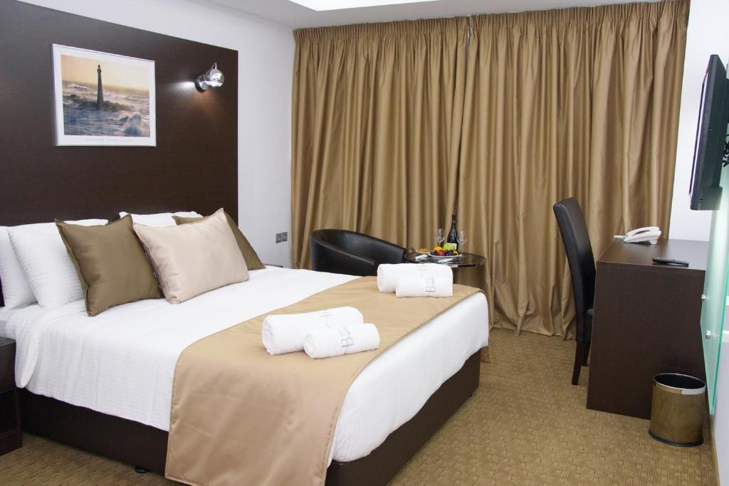 Postel nebo postele na pokoji v ubytování Breeze Boutique Athens by Prima Hotels