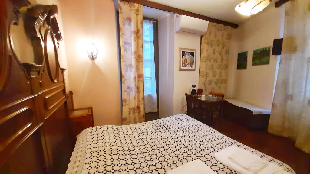 Postel nebo postele na pokoji v ubytování B&B La Veranda - Iseo