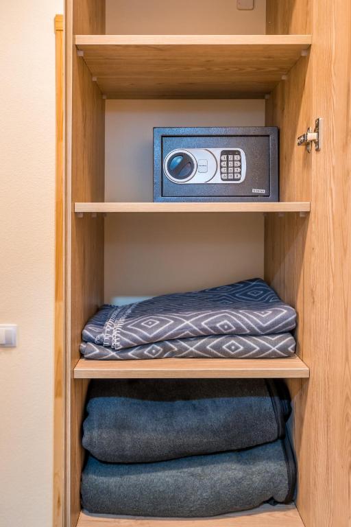 Postel nebo postele na pokoji v ubytování New Gudauri Block 4, Gondola apartment