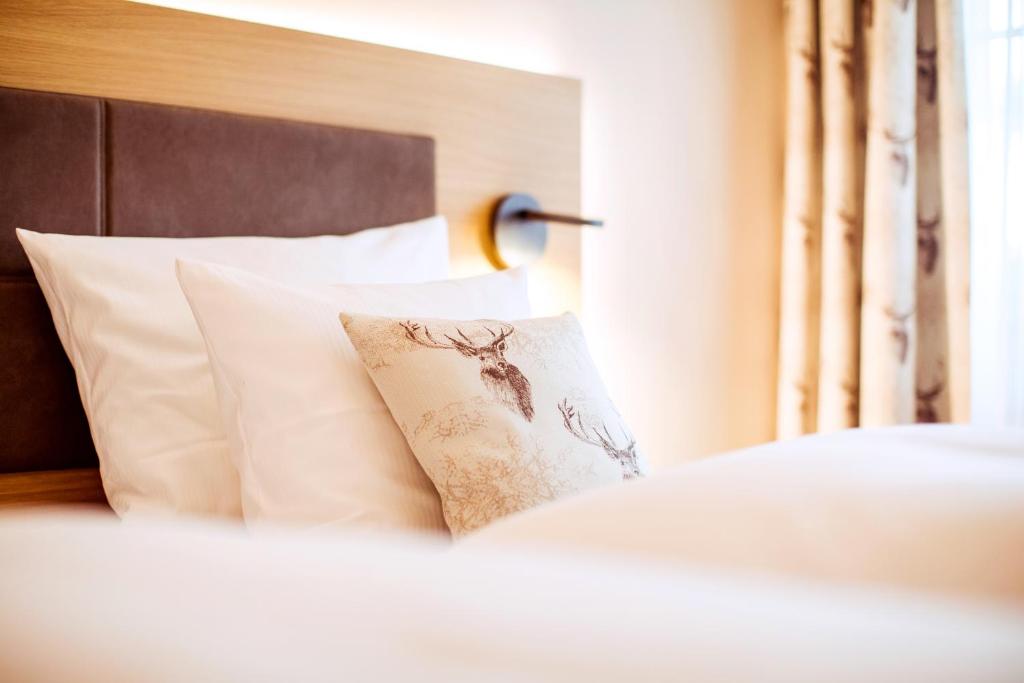 Postel nebo postele na pokoji v ubytování Landgasthof Hotel Gentner