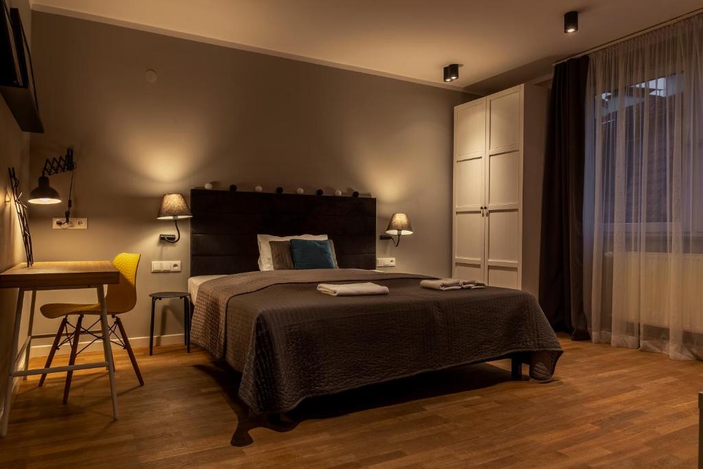 Posteľ alebo postele v izbe v ubytovaní Apartamenty Koci Ogon