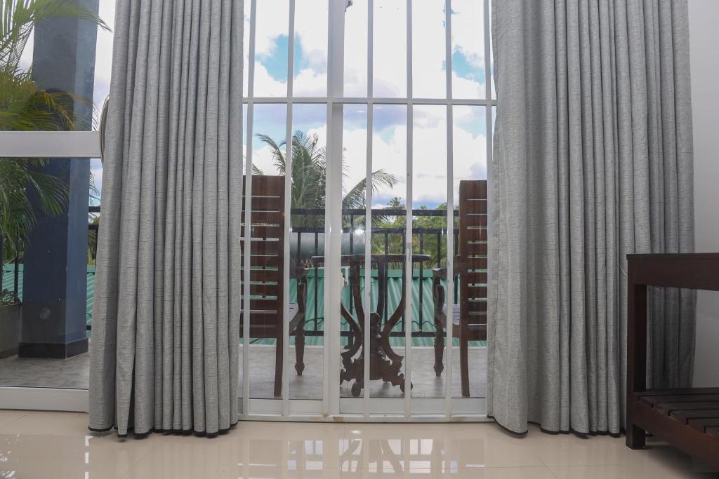 Balkón nebo terasa v ubytování Tinara River Inn, Weligama