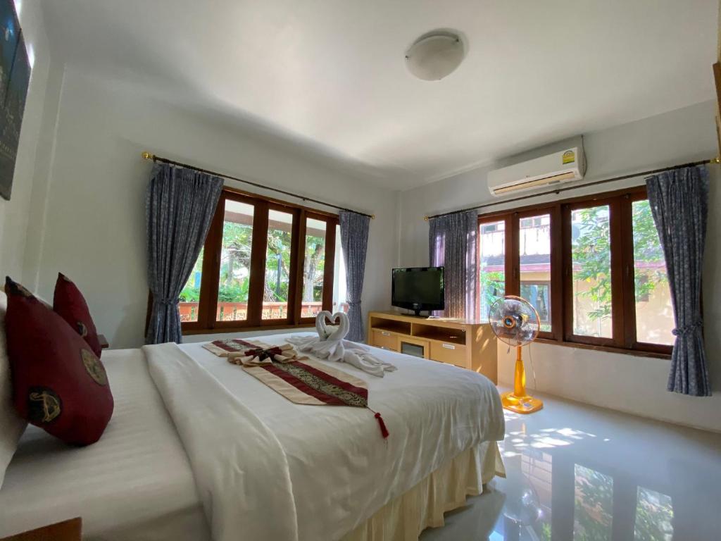 Postel nebo postele na pokoji v ubytování Yuwadee Resort
